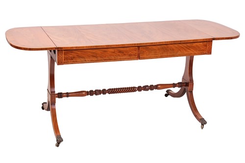 Lot 78 - A Regency mahogany two-flap sofa table with...