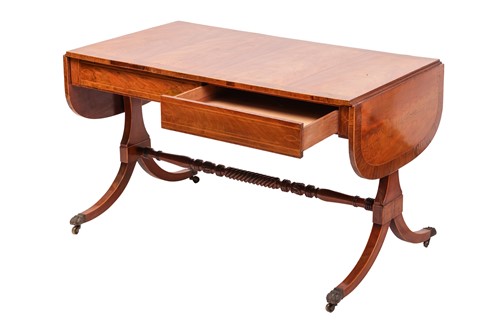Lot 78 - A Regency mahogany two-flap sofa table with...