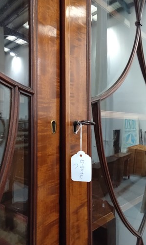 Lot 99 - A late George III mahogany secretaire bookcase,...