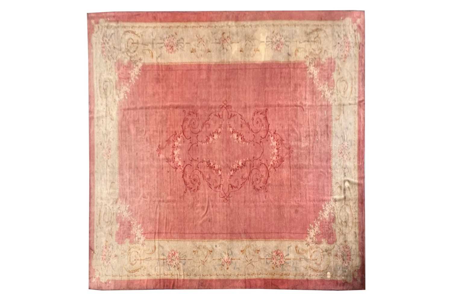 Lot 142 - A muted red/pink ground Austrian Savonerie...