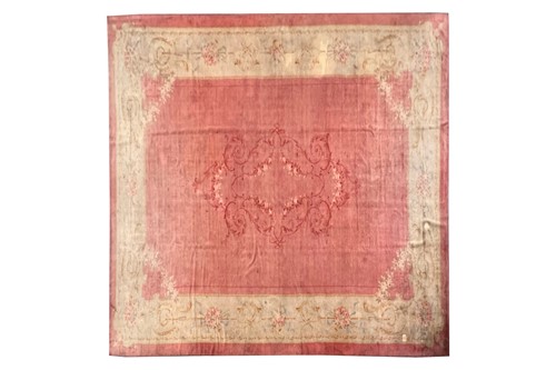 Lot 142 - A muted red/pink ground Austrian Savonerie...