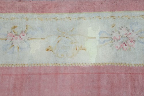 Lot 142 - A muted red/pink ground Austrian Savonerie...