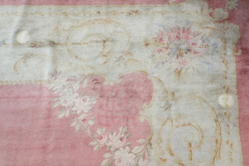 Lot 142 - A muted red/pink ground Austrian Savonerie...