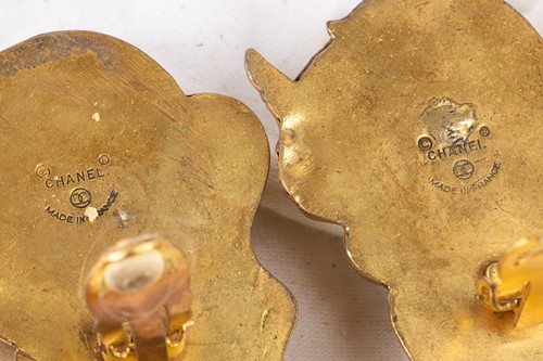 Lot 145 - Chanel - a pair of Baroque-style cherub and...