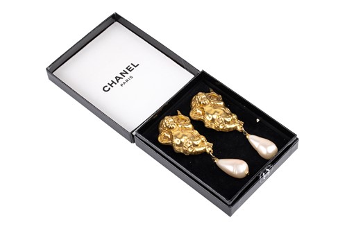 Lot 145 - Chanel - a pair of Baroque-style cherub and...