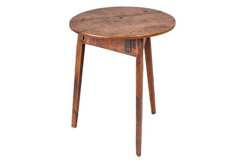 Lot 133 - An early 19th-century rustic elm cricket table...