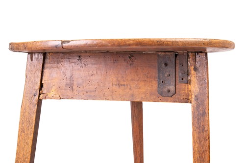 Lot 133 - An early 19th-century rustic elm cricket table...