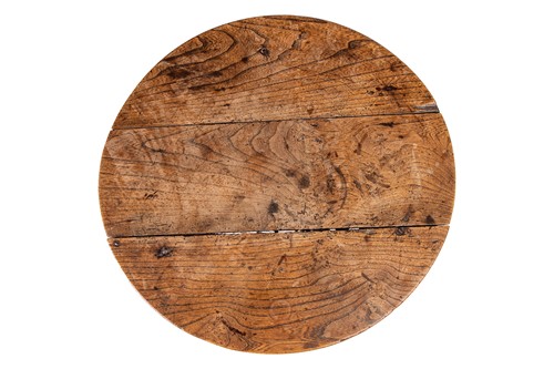 Lot 133 - An early 19th-century rustic elm cricket table...