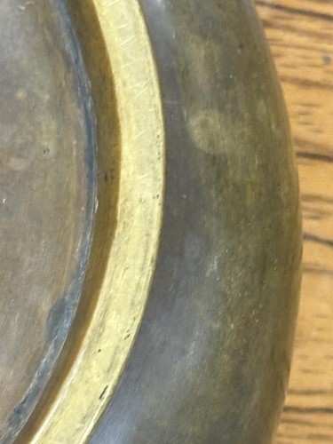 Lot 63 - A Chinese Ming Dynasty style patinated bronze...
