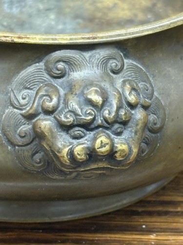 Lot 63 - A Chinese Ming Dynasty style patinated bronze...