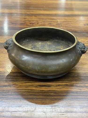 Lot 63 - A Chinese Ming Dynasty style patinated bronze...