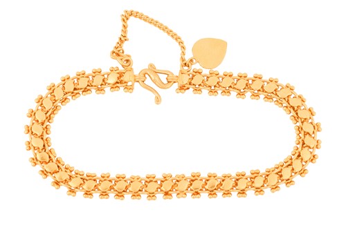 Lot 22 - A fancy link bracelet with small heart charm,...