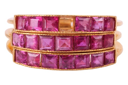 Lot 175 - A ruby-set Harem ring, comprising three flat...