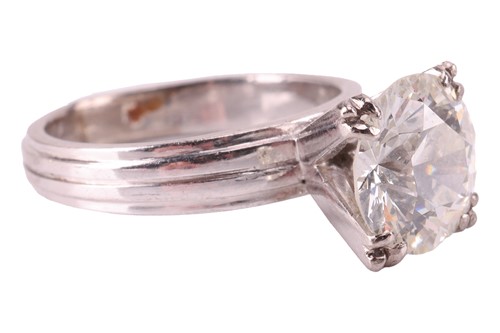 Lot 59 - A diamond solitaire ring, featuring a round...