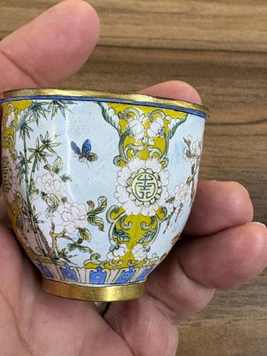Lot 116 - A Chinese Canton-style enamel wine cup of urn...