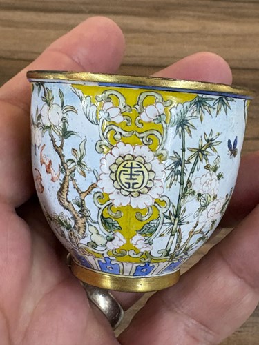 Lot 116 - A Chinese Canton-style enamel wine cup of urn...