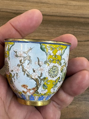 Lot 116 - A Chinese Canton-style enamel wine cup of urn...