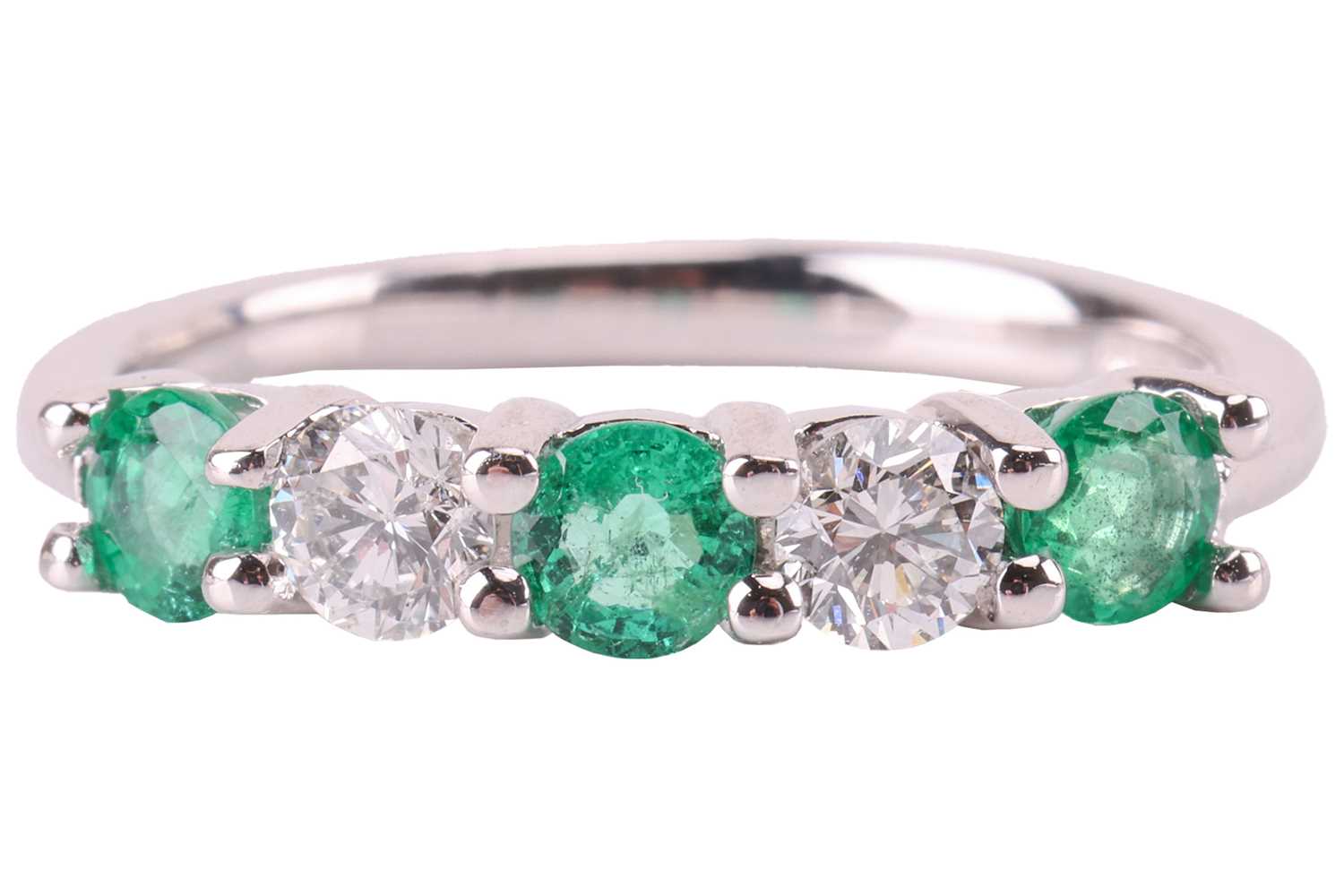 Lot 72 - An emerald and diamond five-stone ring,...