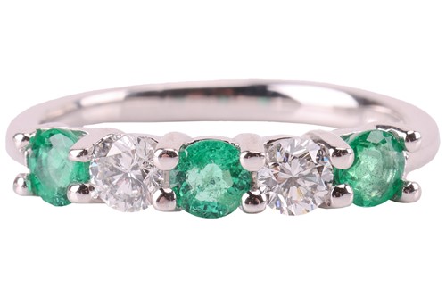 Lot 72 - An emerald and diamond five-stone ring,...
