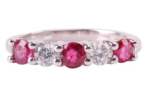 Lot 149 - A ruby and diamond five-stone ring, featuring...
