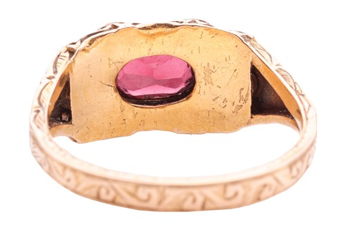 Lot 1 - A gem-set ring, the central oval-shaped garnet...