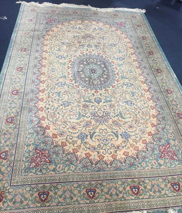 Lot 69 - A large hand woven silk Nain rug with central...