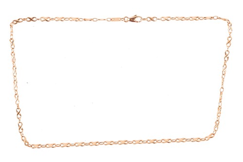 Lot 67 - A necklace the fancy-link chain with figure-of-...
