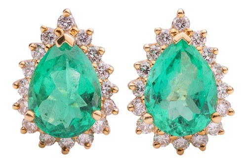 Lot 83 - A pair of emerald and diamond cluster clip-on...