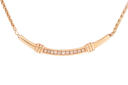 Lot 109 - A diamond-set necklace in 14ct yellow gold,...