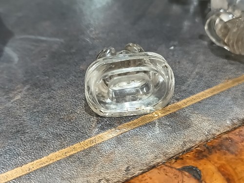 Lot 76 - A Chinese-carved rock crystal snuff flask and...