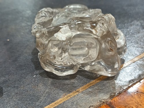 Lot 76 - A Chinese-carved rock crystal snuff flask and...