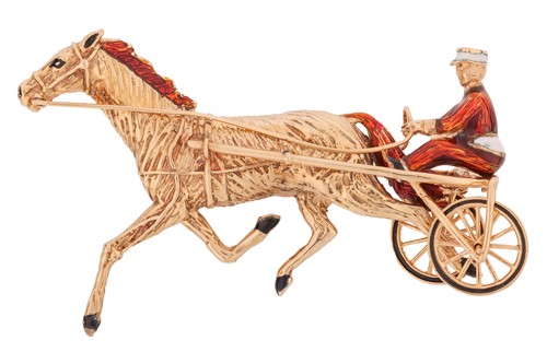 Lot 204 - An enamel harness horse racing brooch, the...