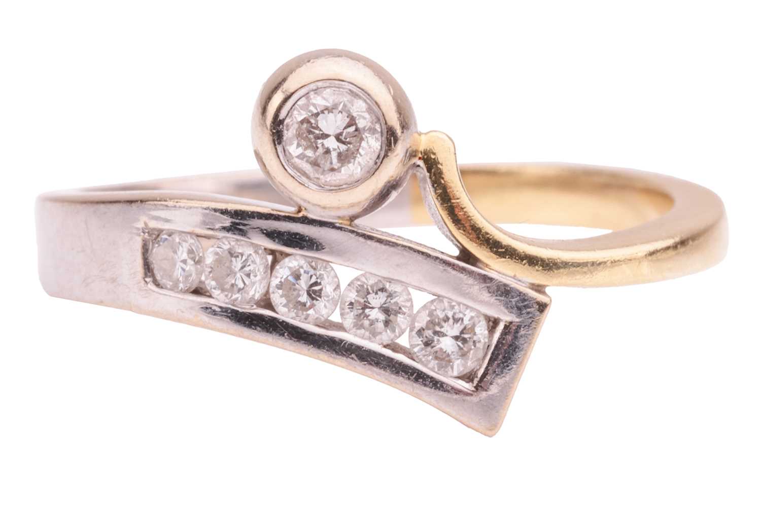 Lot 127 - A diamond-set crossover ring, featuring a...