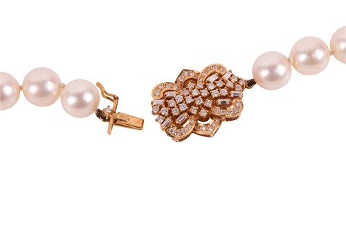 Lot 228 - A long cultured pearl necklace with...