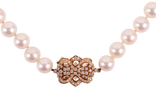 Lot 228 - A long cultured pearl necklace with...