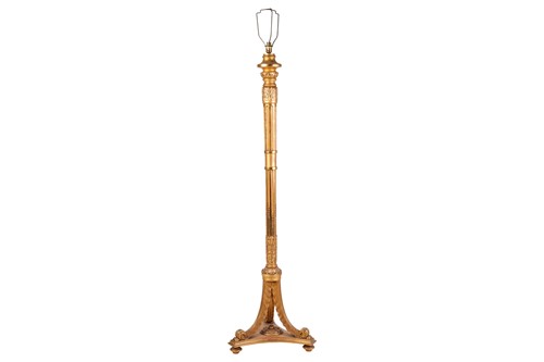 Lot 139 - A carved wood and gilt gesso standard lamp...