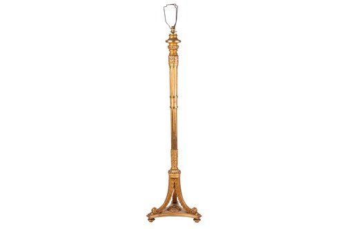 Lot 139 - A carved wood and gilt gesso standard lamp...