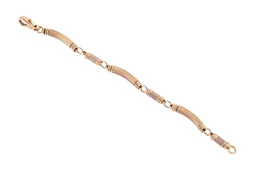 Lot 144 - Boucheron - a two-tone link bracelet in 18ct...