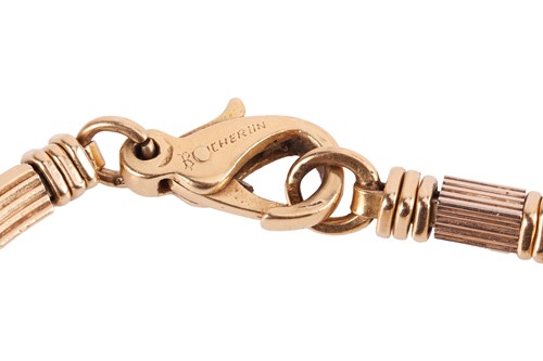 Lot 144 - Boucheron - a two-tone link bracelet in 18ct...