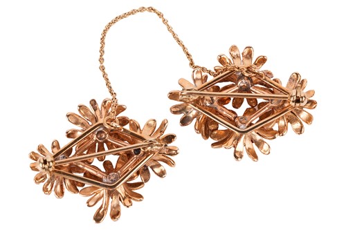 Lot 41 - A pair of gem-set daisy collar brooches, each...