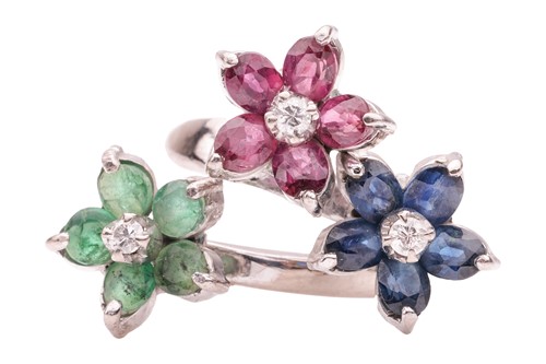 Lot 38 - A floral gem-set crossover ring, featuring...