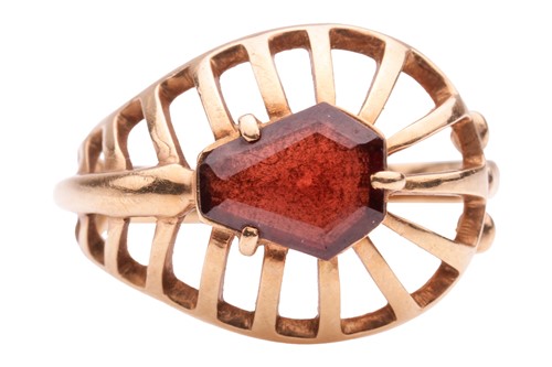 Lot 108 - A garnet-set dress ring, set with a...