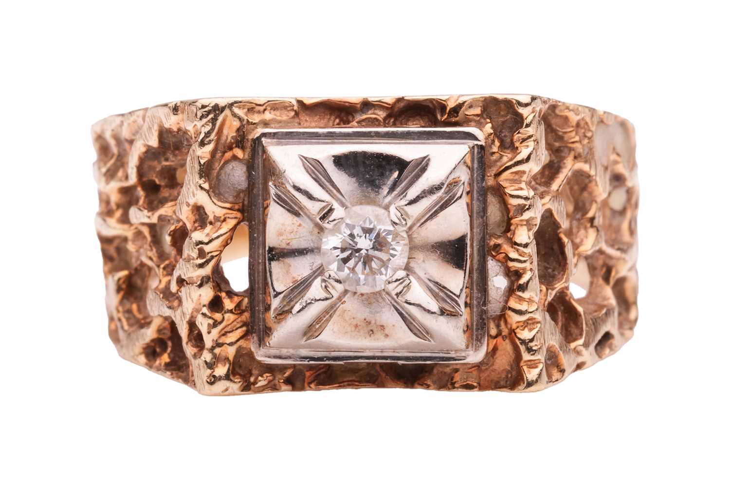 Lot 5 - A Modernist-style dress ring, featuring a...