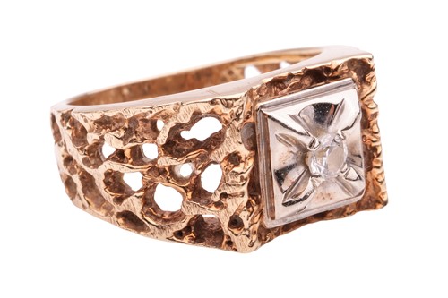 Lot 5 - A Modernist-style dress ring, featuring a...