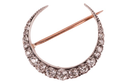 Lot 120 - A Victorian diamond-set crescent brooch, set...