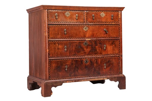 Lot 115 - An early 18th-century walnut chest of two...