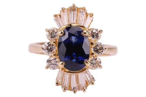 Lot 112 - A sapphire and diamond ballerina ring, centred...