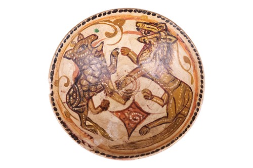 Lot 67 - A Persian Nishapur circular pottery bowl, 10th...