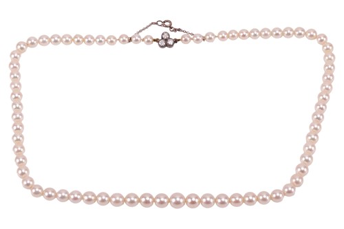 Lot 198 - A cultured pearl necklace with a diamond-set...