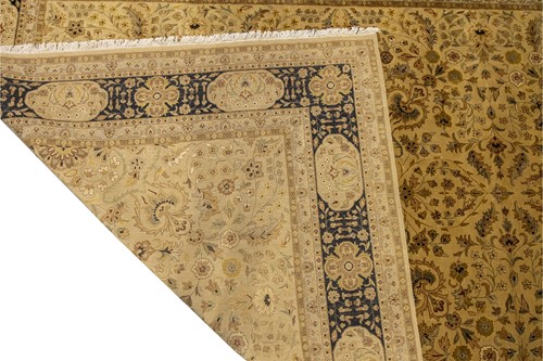 Lot 146 - An Indian ivory ground "Agra" carpet,...